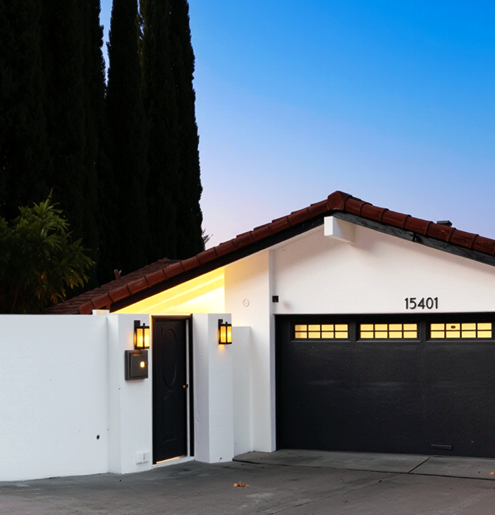Custom home exterior construction at twilight by DG Custom Construction in Los Angeles CA